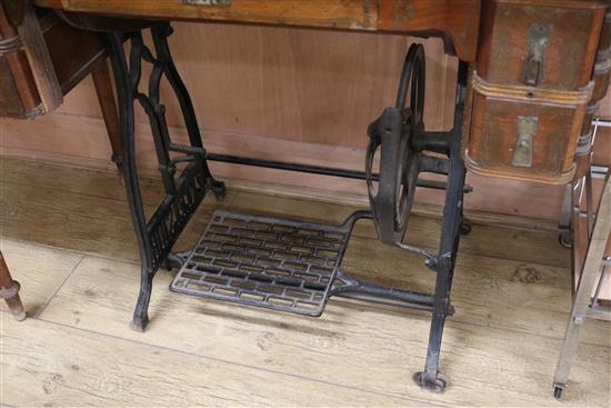 An Excelsior sewing machine within table W.95cm